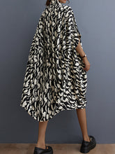 Vestido midi con solapa suelta y estampado floral retro literario